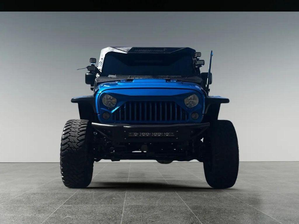 used 2015 Jeep Wrangler Unlimited car, priced at $24,997