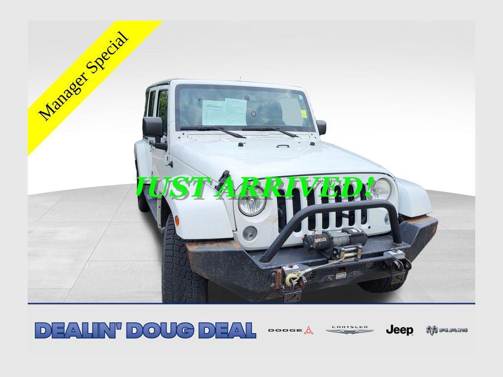 used 2014 Jeep Wrangler Unlimited car, priced at $17,129
