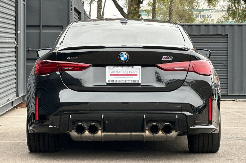 used 2025 BMW M4 car, priced at $87,994