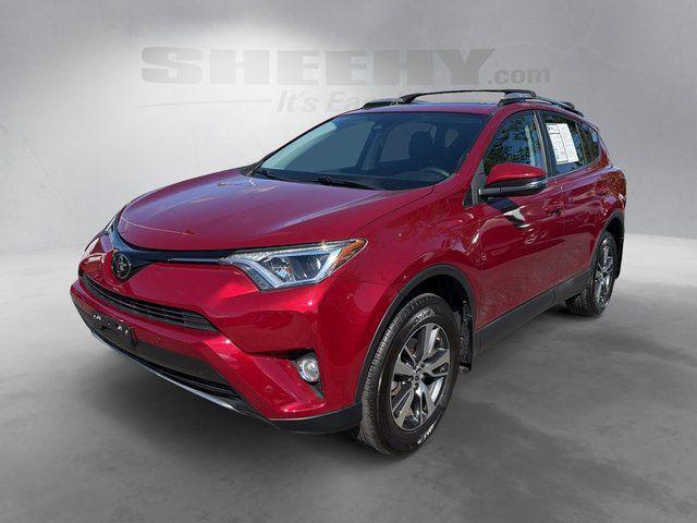 used 2018 Toyota RAV4 car, priced at $25,061