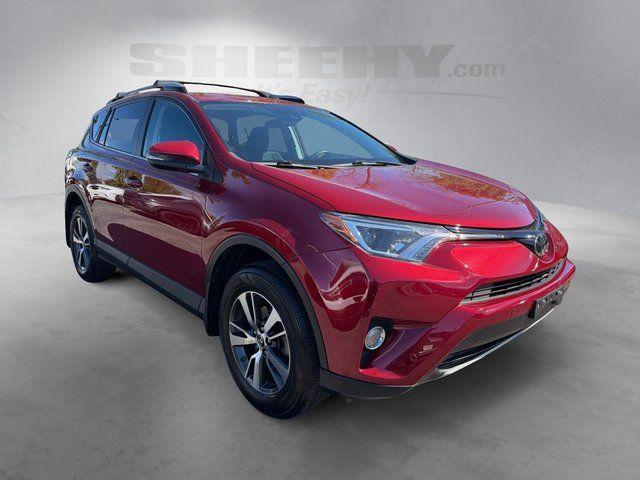 used 2018 Toyota RAV4 car, priced at $25,061