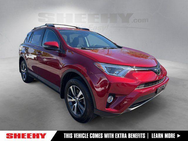 used 2018 Toyota RAV4 car, priced at $25,061