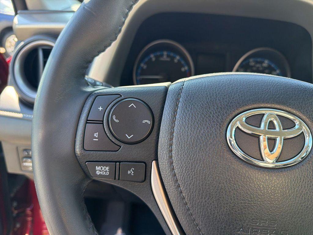 used 2018 Toyota RAV4 car, priced at $25,061