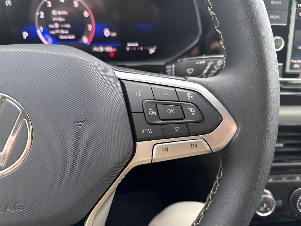 used 2024 Volkswagen Taos car, priced at $21,333