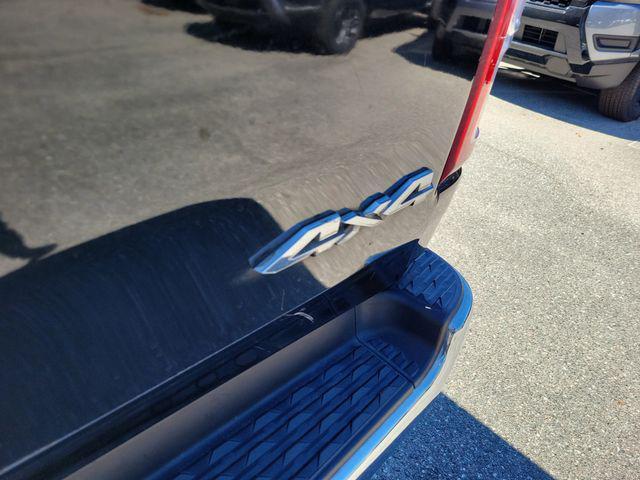 used 2021 Ram 1500 car, priced at $28,000