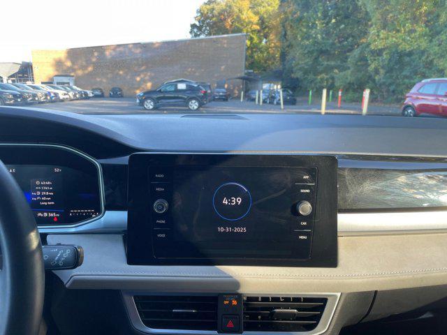 used 2025 Volkswagen Taos car, priced at $23,048