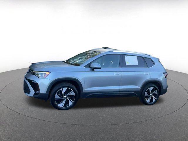used 2025 Volkswagen Taos car, priced at $23,048