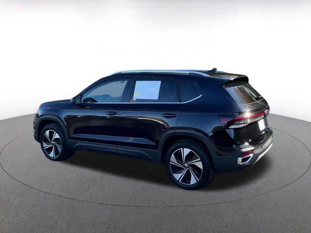 used 2025 Volkswagen Taos car, priced at $23,297