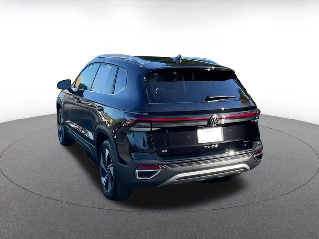 used 2025 Volkswagen Taos car, priced at $23,297