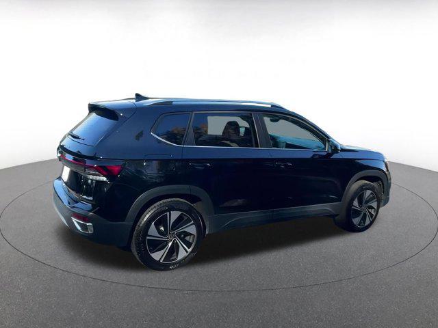 used 2025 Volkswagen Taos car, priced at $23,297