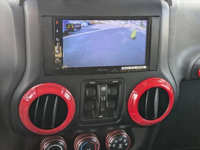 used 2015 Jeep Wrangler Unlimited car, priced at $16,637