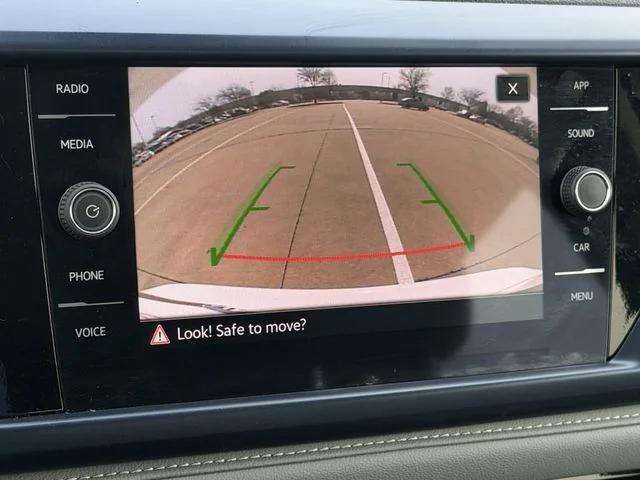 used 2024 Volkswagen Taos car, priced at $22,441