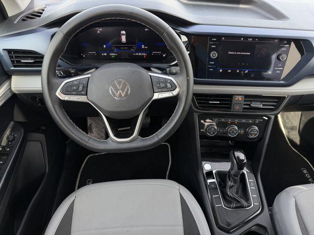 used 2024 Volkswagen Taos car, priced at $22,441