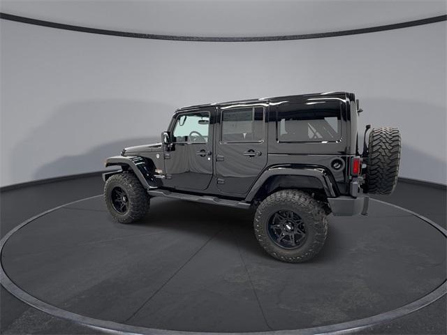 used 2015 Jeep Wrangler Unlimited car, priced at $15,473