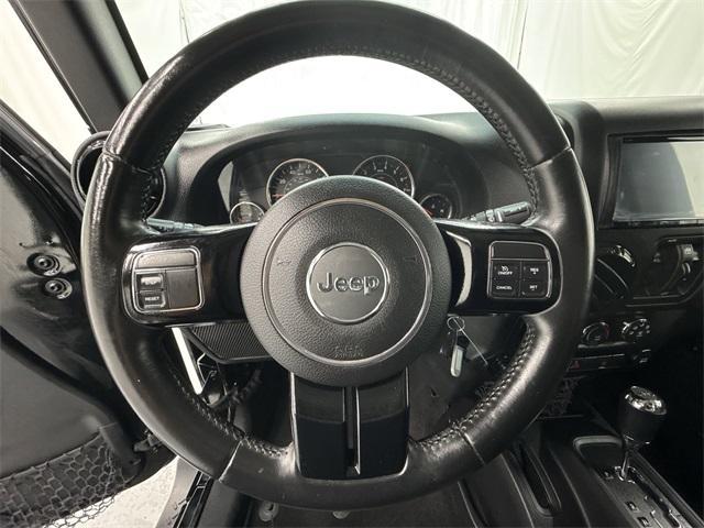 used 2015 Jeep Wrangler Unlimited car, priced at $15,473