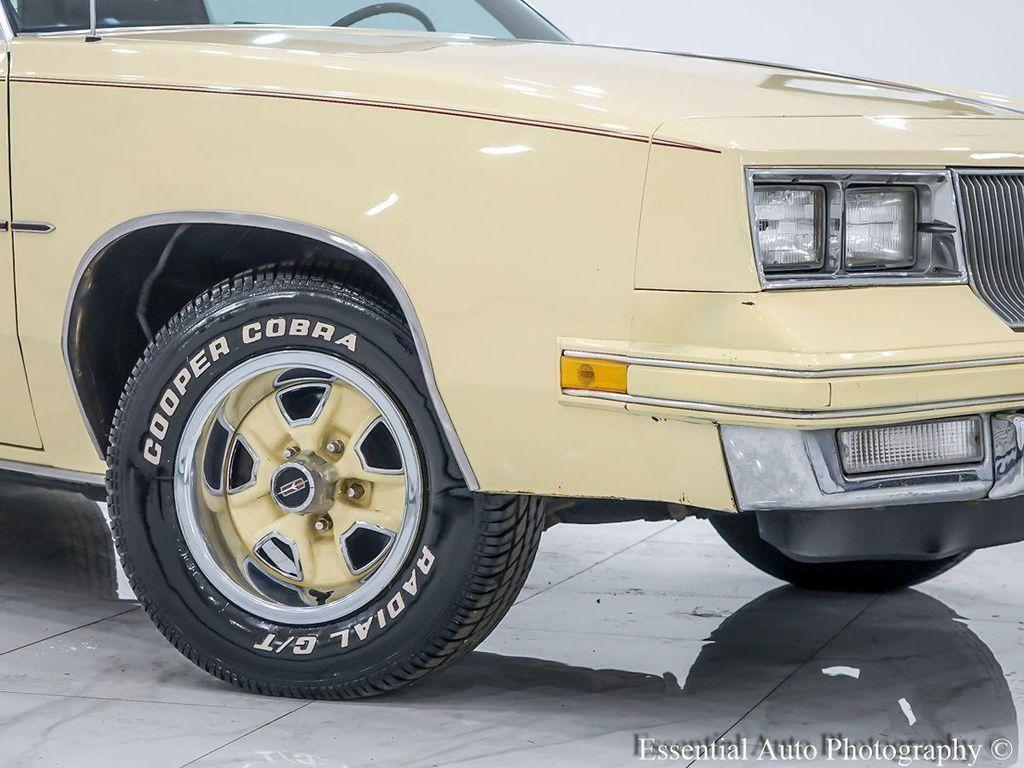 1986 Yellow Oldsmobile Cutlass