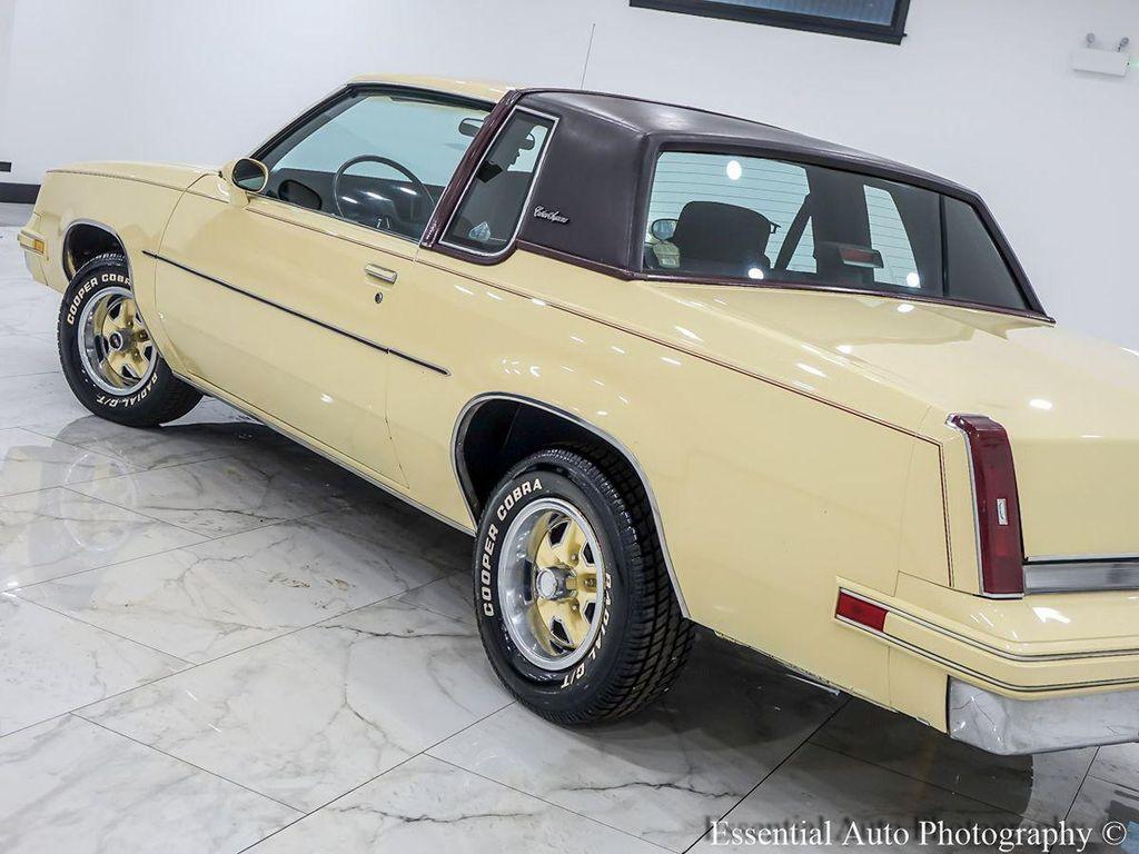 1986 Yellow Oldsmobile Cutlass