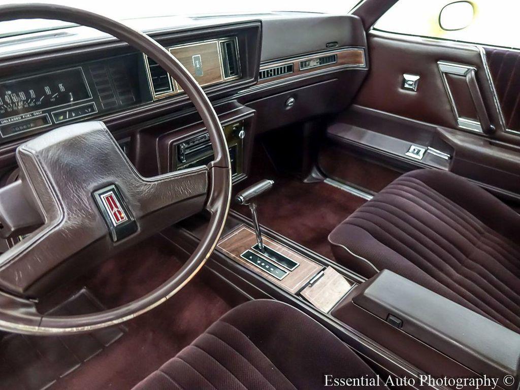 1986 Yellow Oldsmobile Cutlass