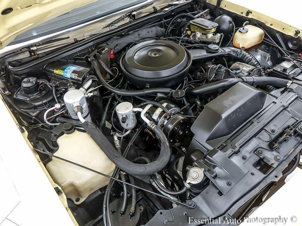 1986 Yellow Oldsmobile Cutlass