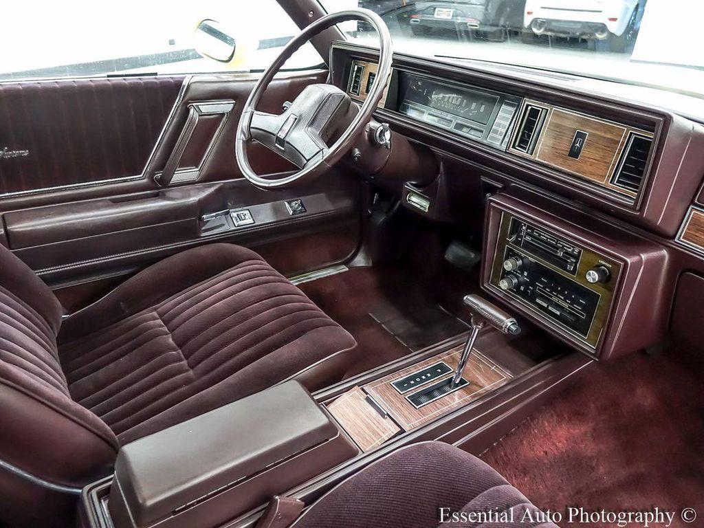 1986 Yellow Oldsmobile Cutlass
