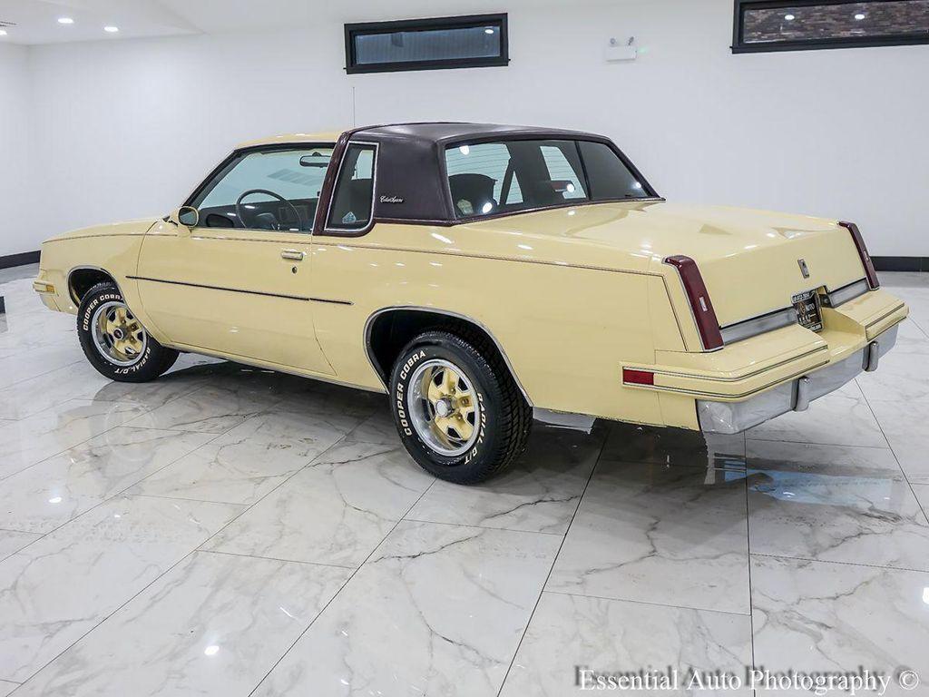 1986 Yellow Oldsmobile Cutlass