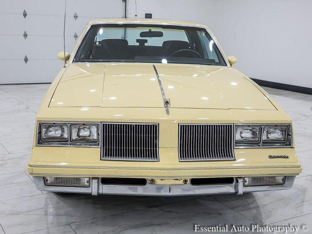 1986 Yellow Oldsmobile Cutlass
