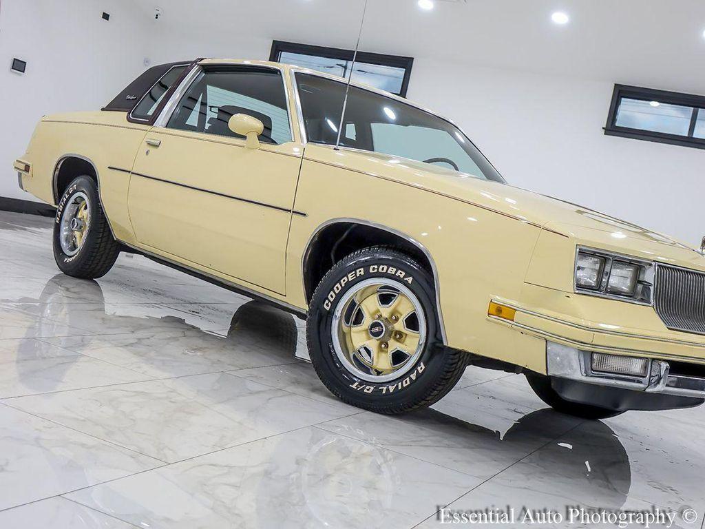1986 Yellow Oldsmobile Cutlass