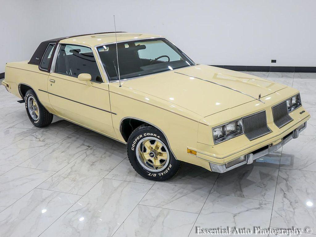 1986 Yellow Oldsmobile Cutlass