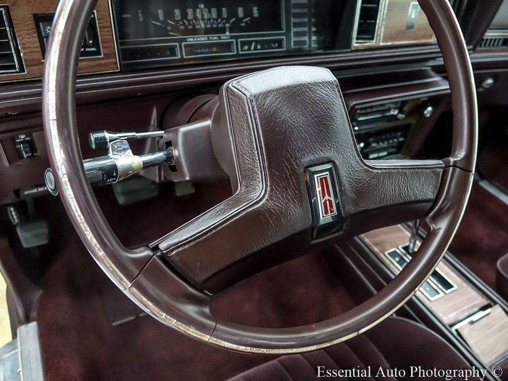 1986 Yellow Oldsmobile Cutlass