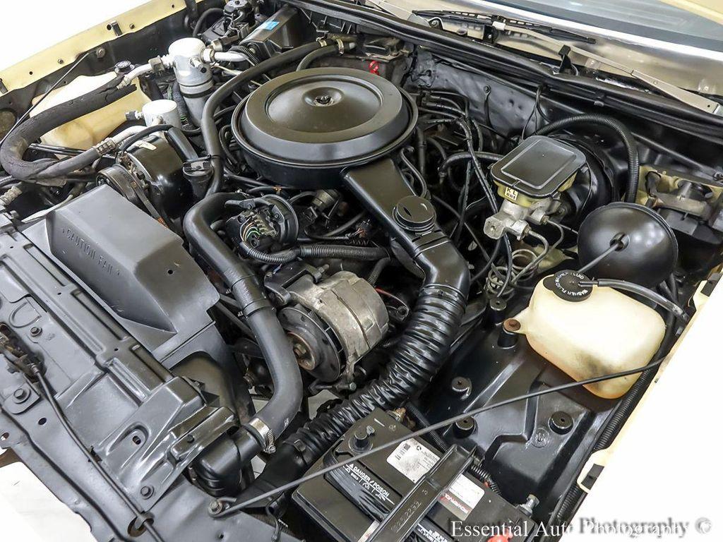 1986 Yellow Oldsmobile Cutlass