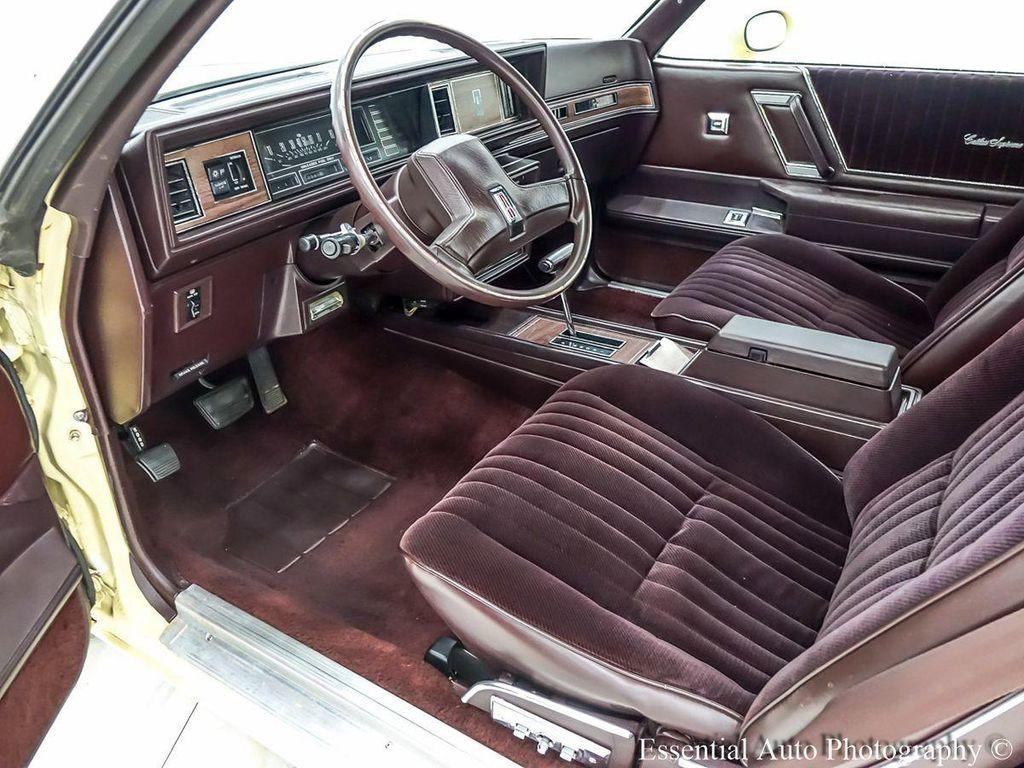 1986 Yellow Oldsmobile Cutlass