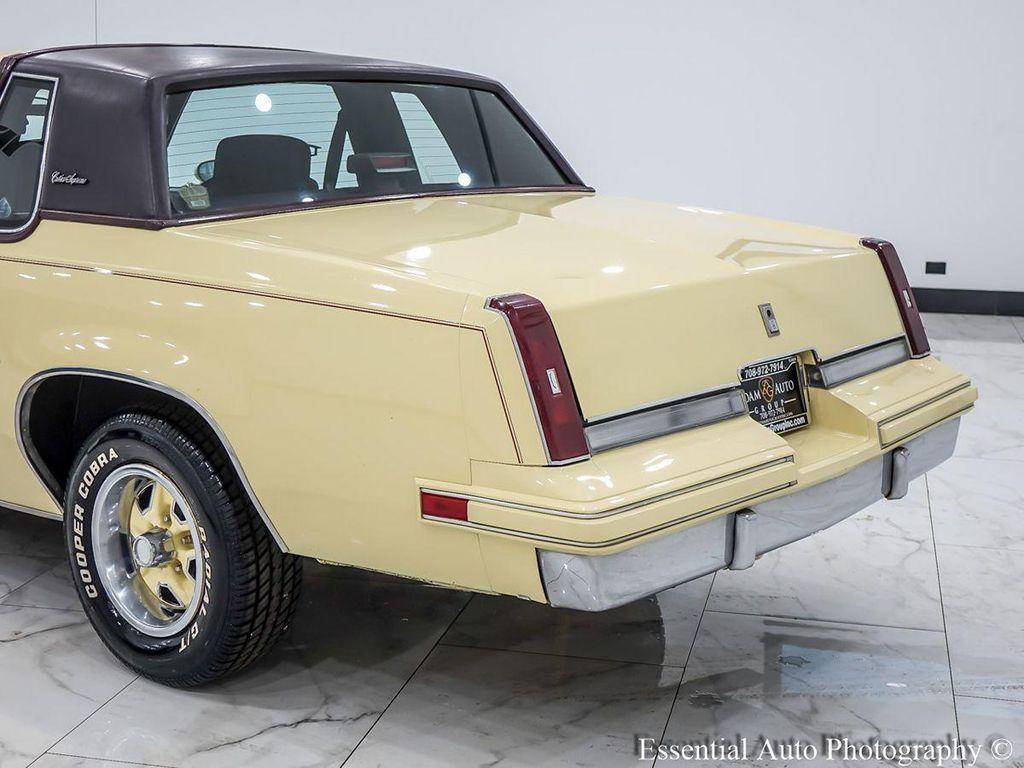1986 Yellow Oldsmobile Cutlass