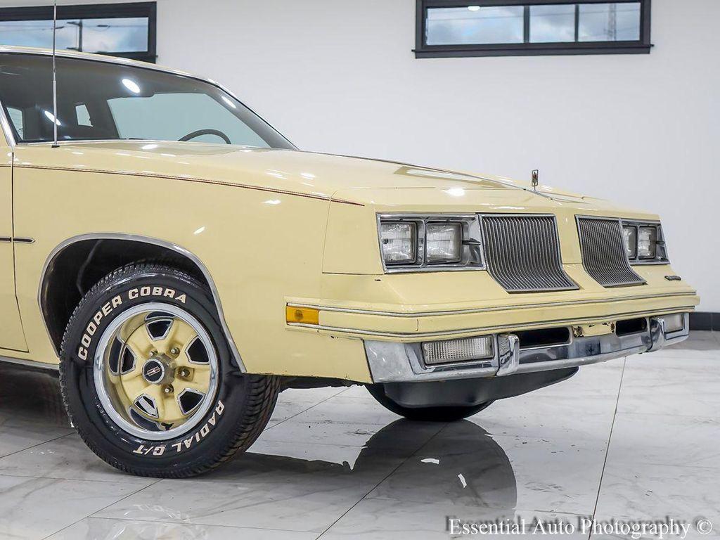 1986 Yellow Oldsmobile Cutlass