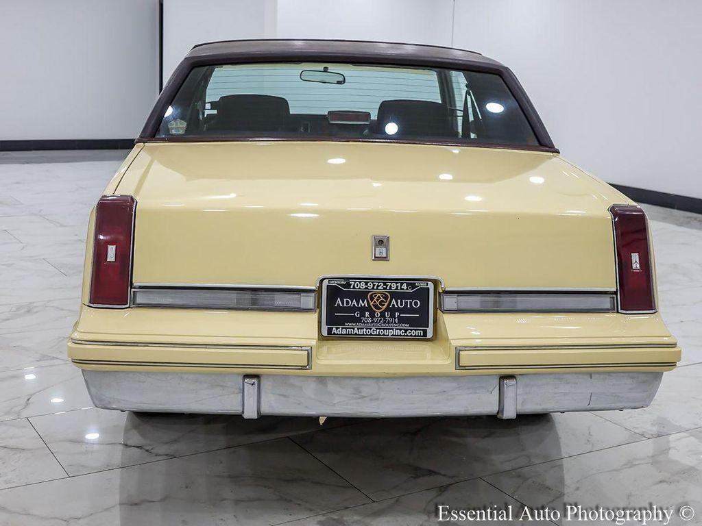 1986 Yellow Oldsmobile Cutlass