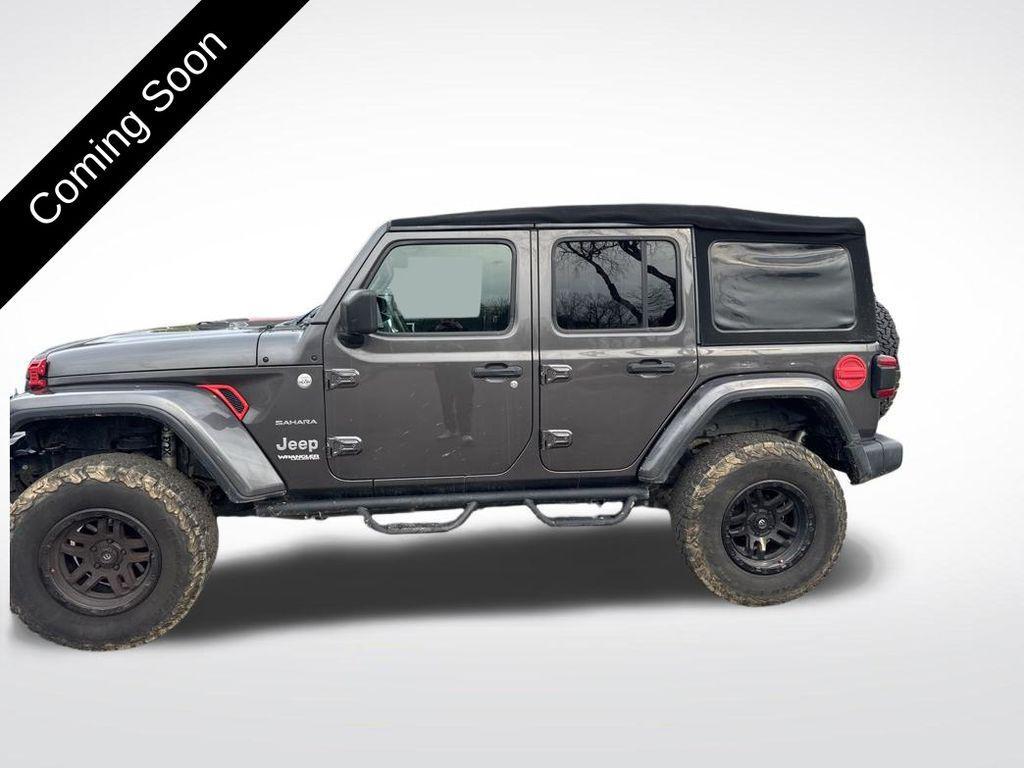 used 2018 Jeep Wrangler Unlimited car, priced at $22,696