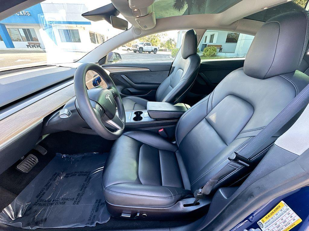 used 2023 Tesla Model 3 car, priced at $22,700