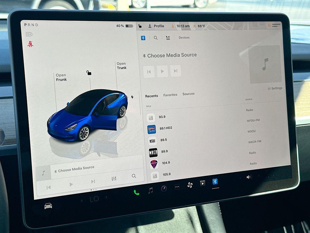 used 2023 Tesla Model 3 car, priced at $22,700