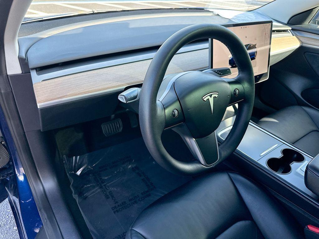 used 2023 Tesla Model 3 car, priced at $22,700
