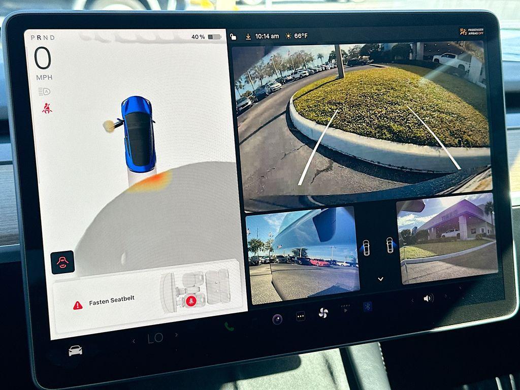 used 2023 Tesla Model 3 car, priced at $22,700