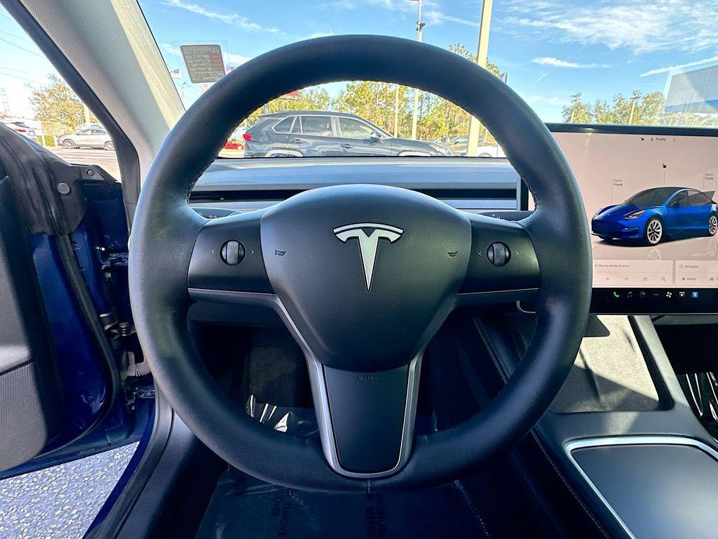 used 2023 Tesla Model 3 car, priced at $22,700