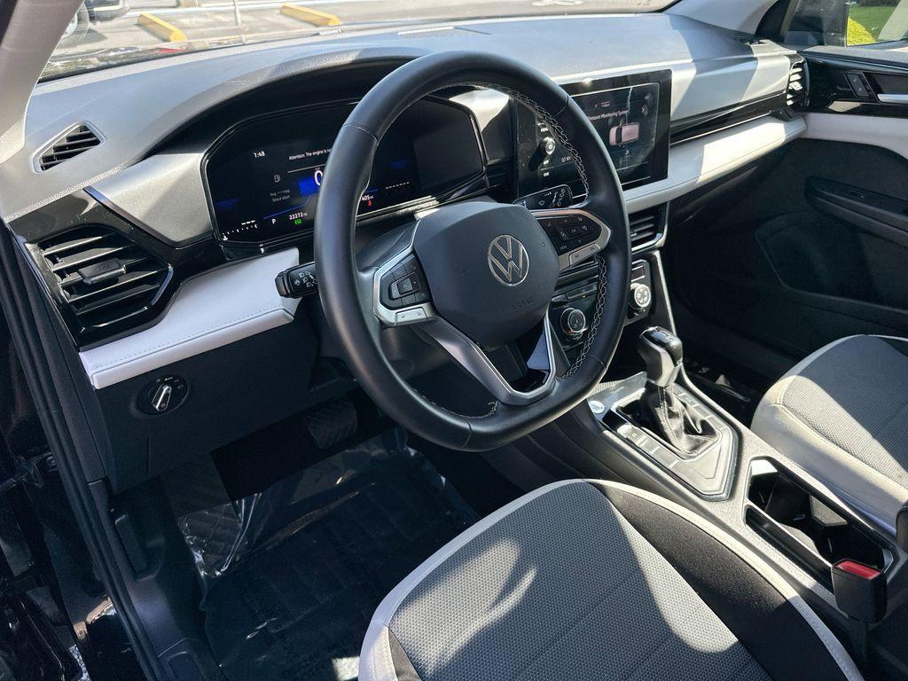 used 2025 Volkswagen Taos car, priced at $20,000
