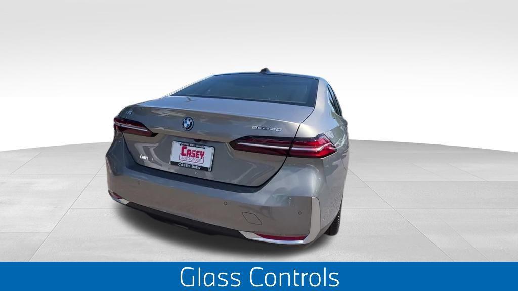 used 2025 BMW i5 car, priced at $68,195