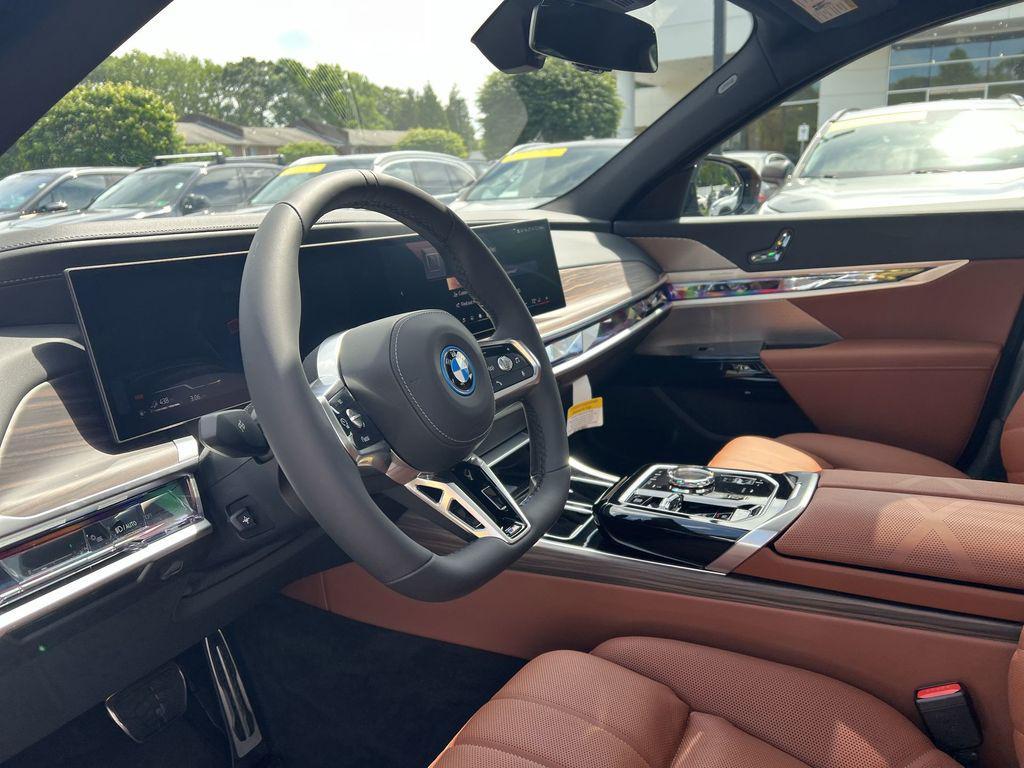 used 2025 BMW 750e car, priced at $107,135