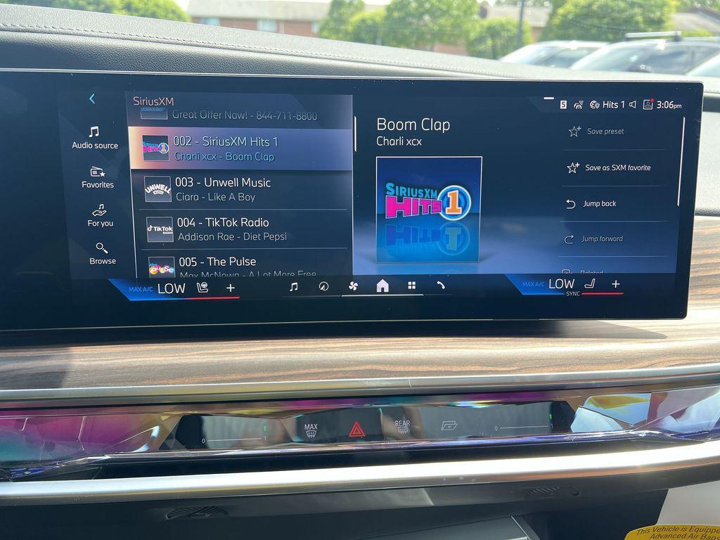 used 2025 BMW 750e car, priced at $107,135