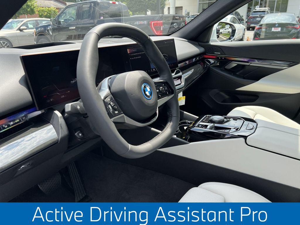 used 2025 BMW i5 car, priced at $59,995