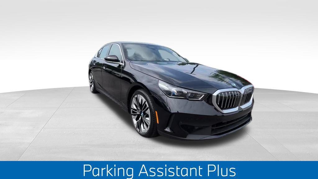 used 2025 BMW i5 car, priced at $74,476