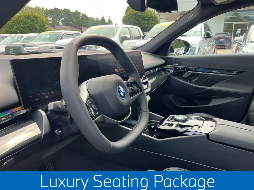 used 2025 BMW i5 car, priced at $74,476