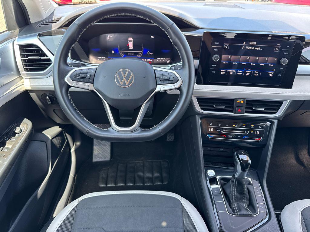 used 2025 Volkswagen Taos car, priced at $23,888