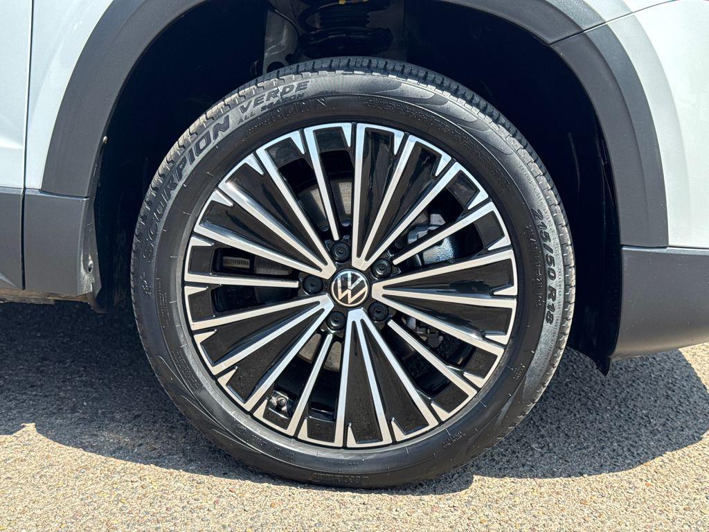 used 2025 Volkswagen Taos car, priced at $23,888