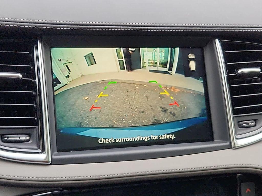 used 2025 INFINITI QX50 car, priced at $34,999